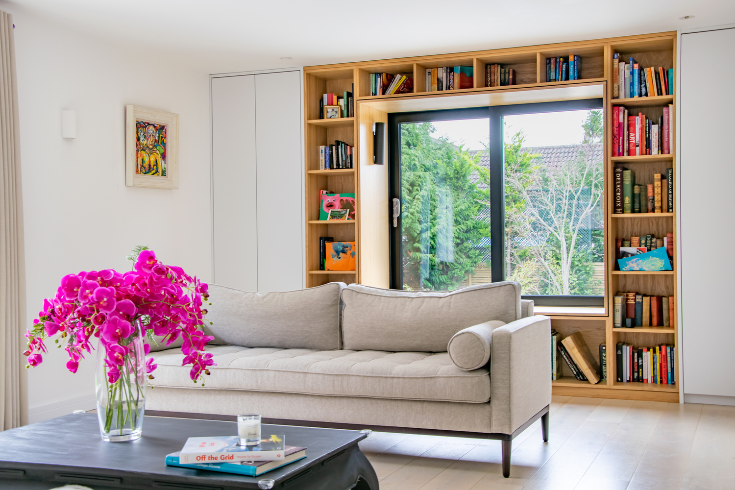 Contemporary residential house designed by Beacham Architects, featuring timber-clad pitched roofs, dormer windows, and a modern reinterpretation of a traditional London home.